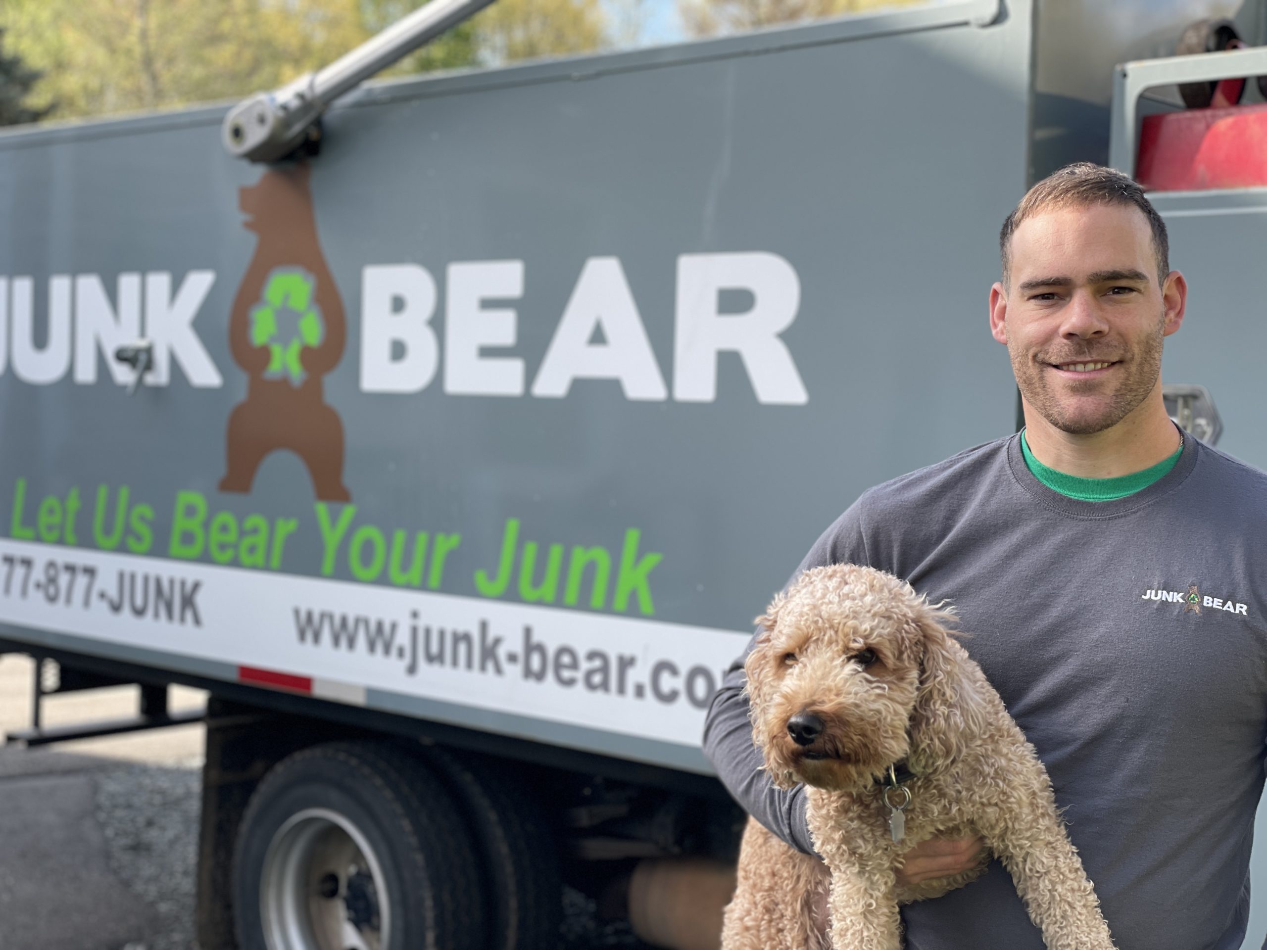 Junk Bear team member with dog
