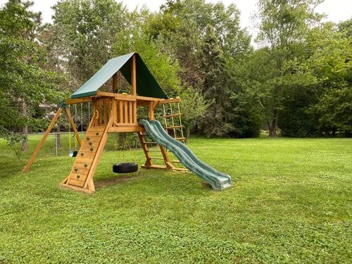 Wood swing set in need of swing set removal services in Connecticut